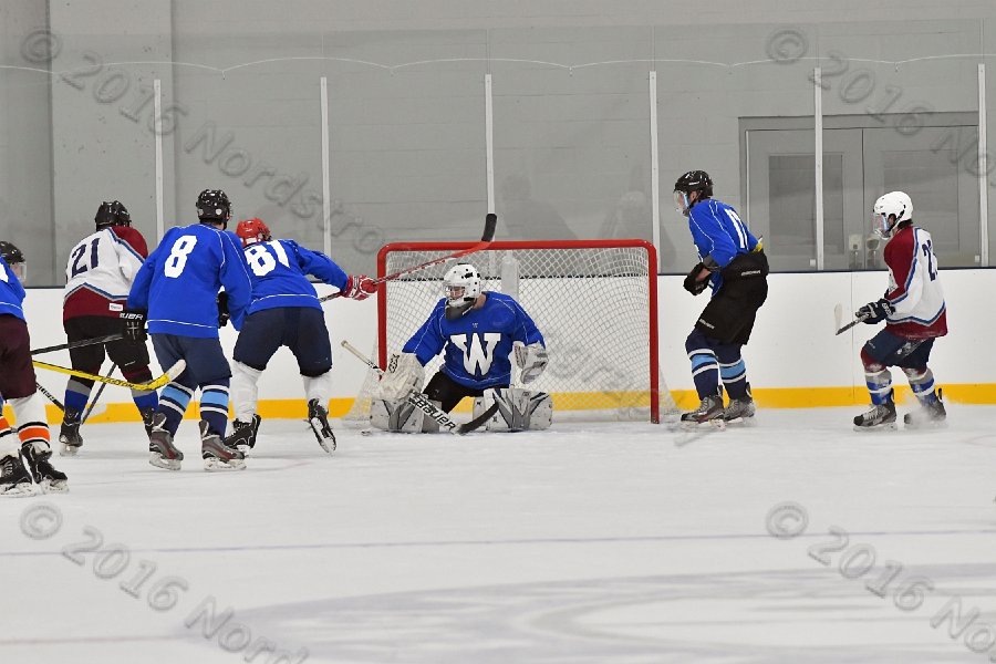 Wheaton College Men\'s Ice Hockey vs Middlesex Community College. - Photo By: KEITH NORDSTROM